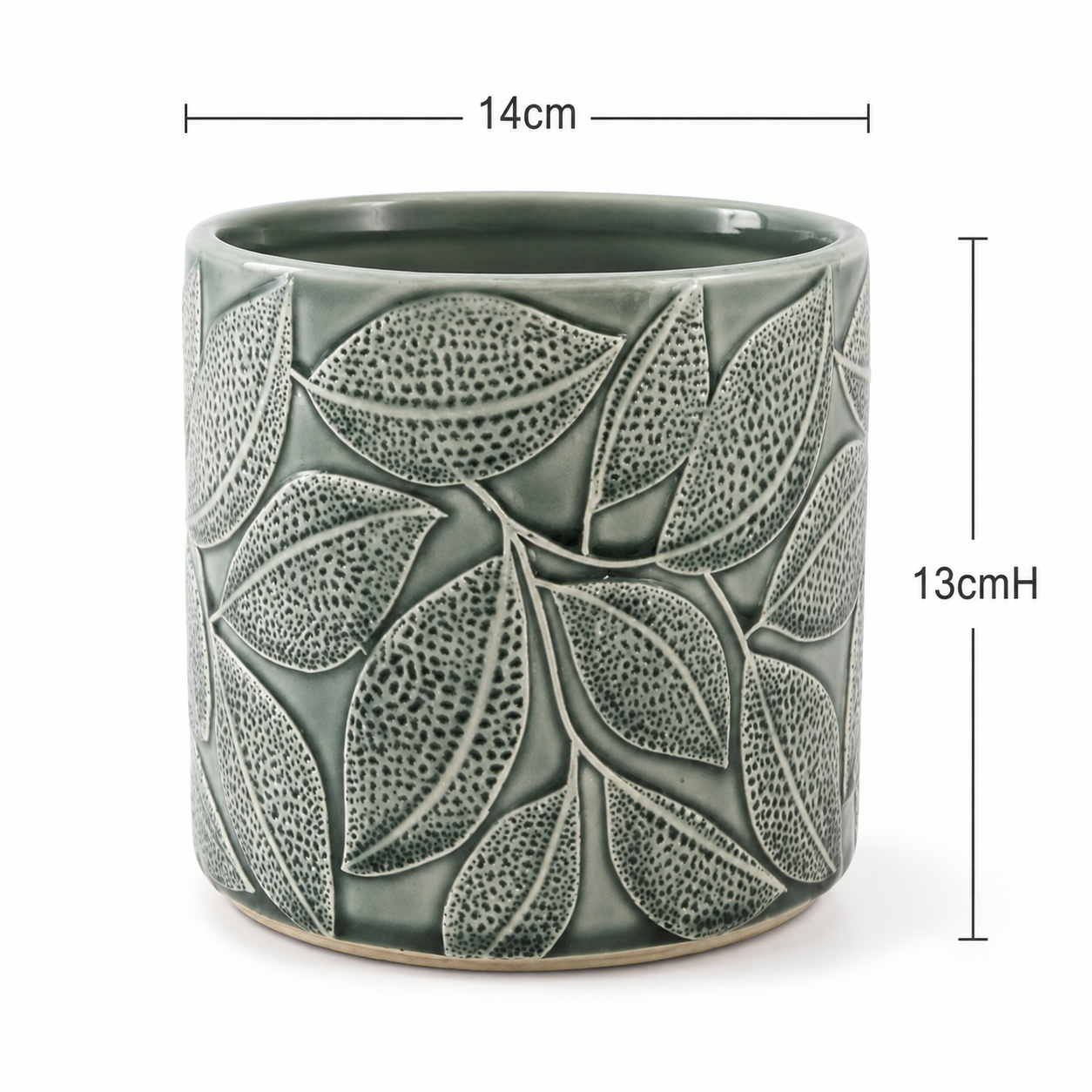 Forest Vein Ceramic Planter Its clean cylindrical shape offers a balanced and versatile silhouette that works beautifully in both contemporary and traditional interiors. The softly glazed rim and earthy colour palette make it especially suitable for white or pastel Phalaenopsis orchids, while also complementing foliage plants, succulents and artificial arrangements. Compact yet visually distinctive, this planter is ideal for dining tables, office desks, reception counters, shelves and thoughtful gift presentations. Product Details Product: Decorative ceramic planter Colour: Sage green with ivory leaf detailing Diameter: Approximately 14cm Height: Approximately 13cm Cylindrical shape Raised botanical leaf pattern Detailed dotted texture Suitable for orchids, foliage plants, succulents and decorative arrangements Plant and arrangement accessories are not included Measurements are approximate, and slight variations in colour or finish may occur.